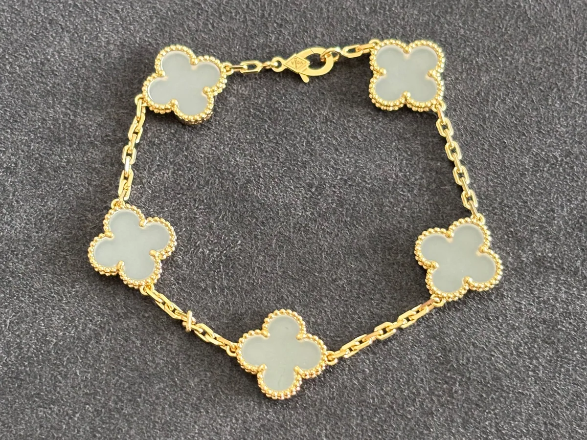 Yellow gold bracelet set with natural certified stones