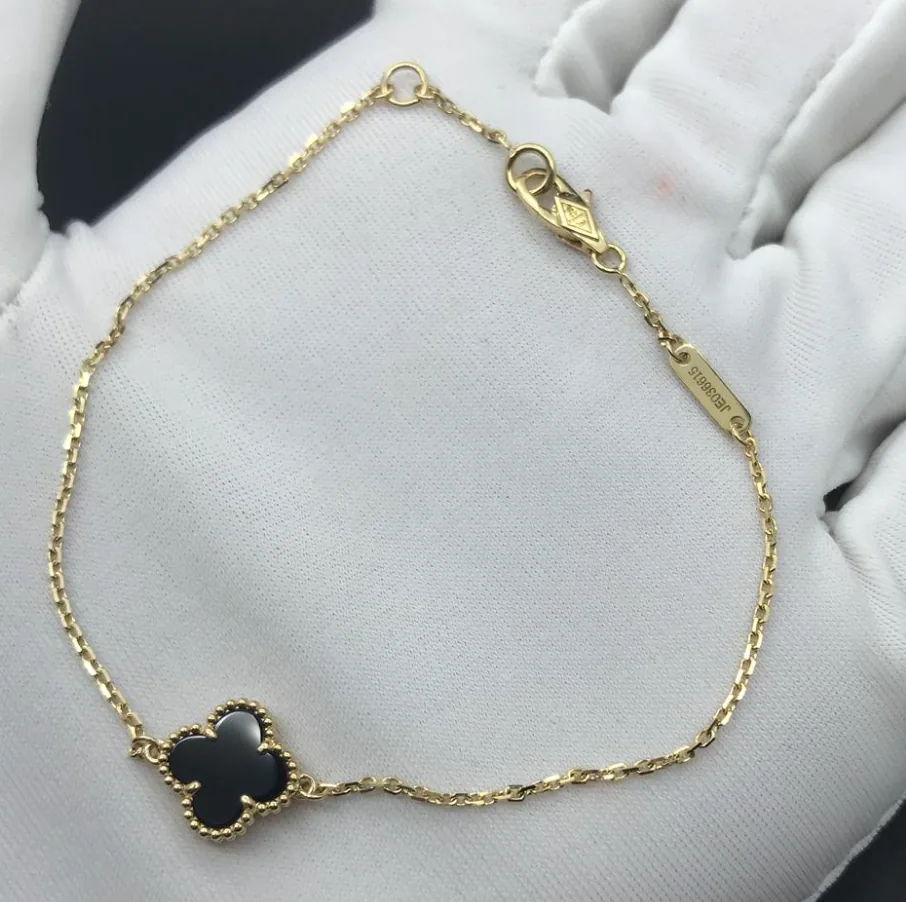 Yellow gold bracelet set with natural certified stones