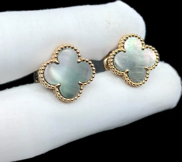 Rose gold earrings set with natural certified stones