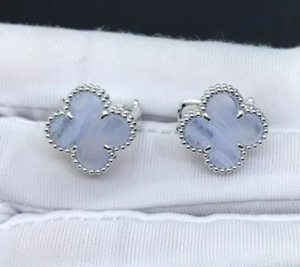 White gold earrings set with natural certified stones