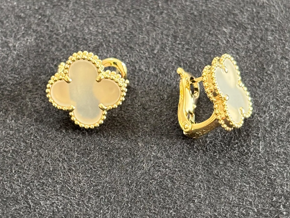 Yellow gold earrings set with natural certified stones
