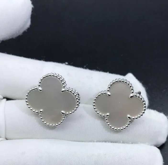 Yellow gold earrings set with natural certified stones