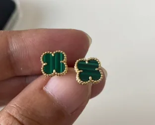 Yellow gold earrings set with natural certified stones