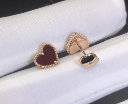 Rose gold earrings set with natural certified stones