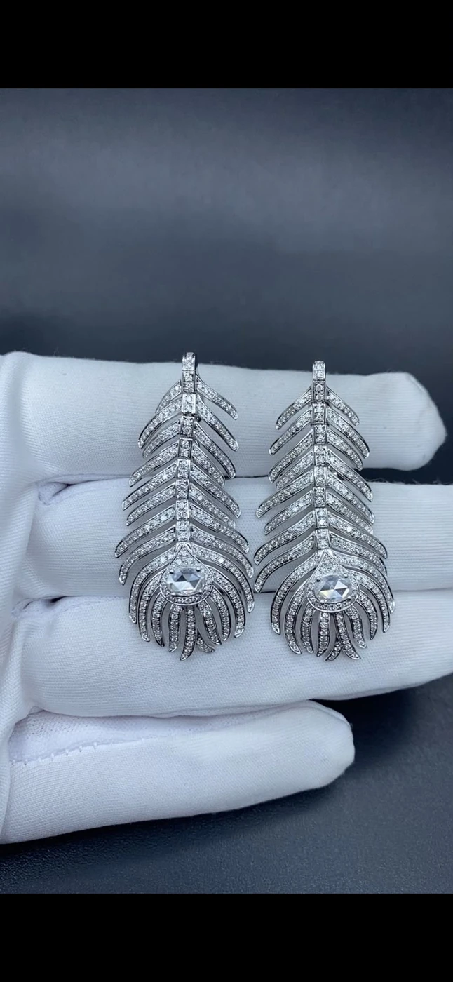 Feather drop earrings