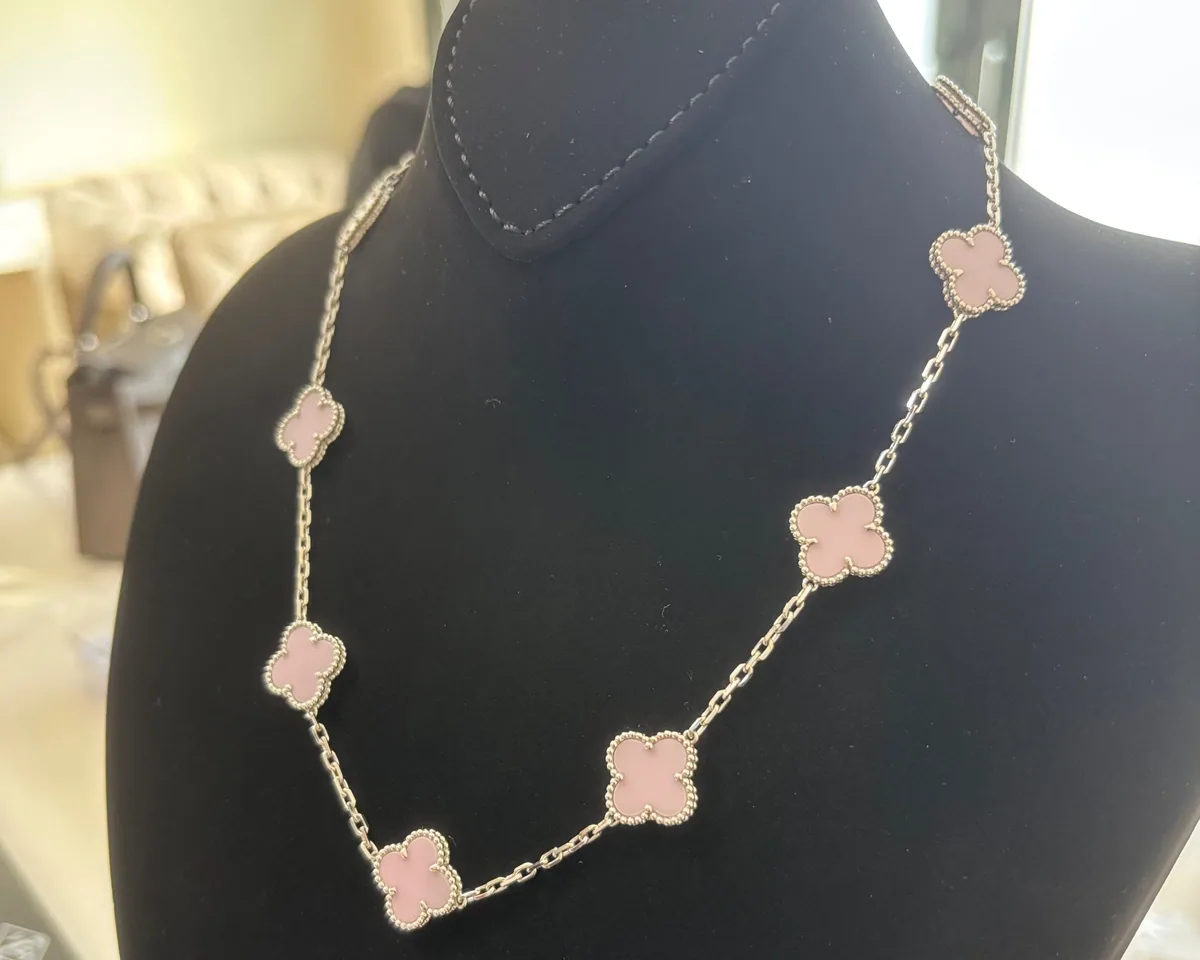 White gold necklace set with natural certified stones