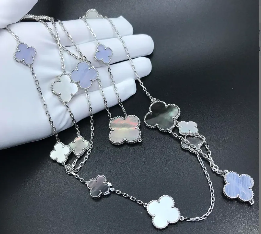 White gold necklace set with natural certified stones