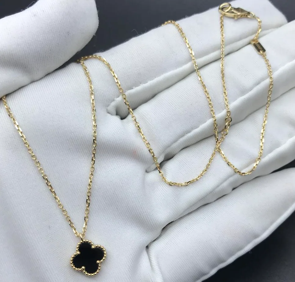 Yellow gold necklace set with natural certified stones